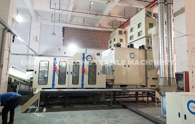 Single cylinder carding machine with middle speed