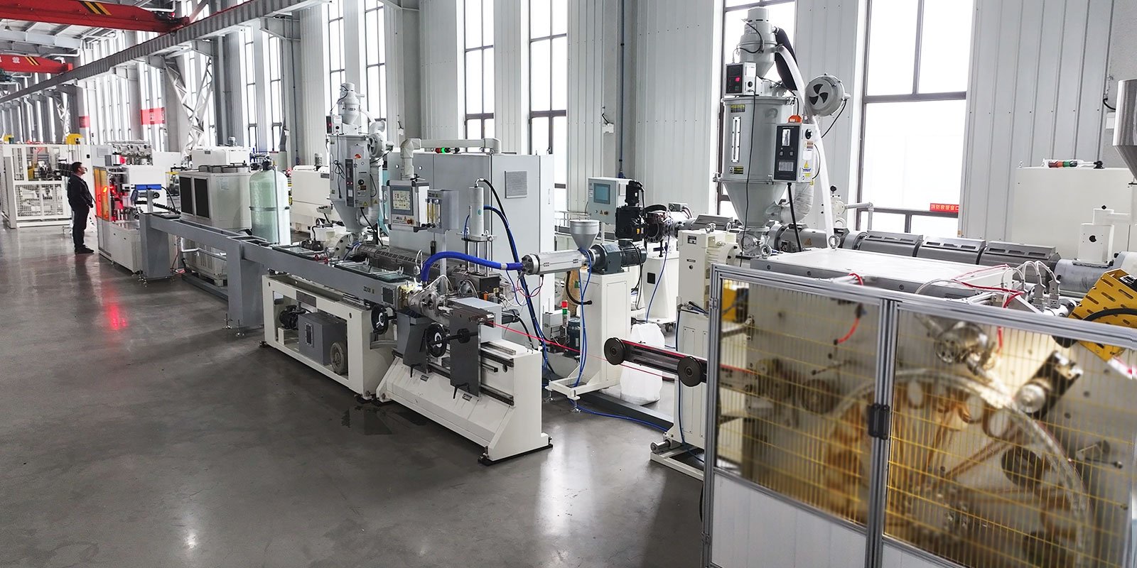 The t-tape drip irrigation tape production line integrates the extrusion and embedding processes into a single operation, eliminating the need for additional dripper molds.