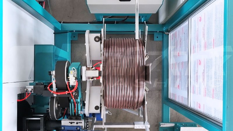 The fully automatic winding machine is uniformly winding the drip irrigation pipes and automatically unwinding them.