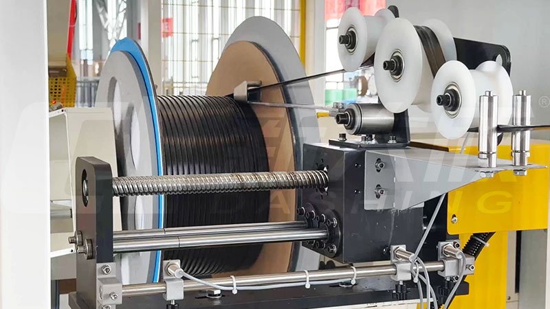 Automatic winding machine for finished drip tape rolls